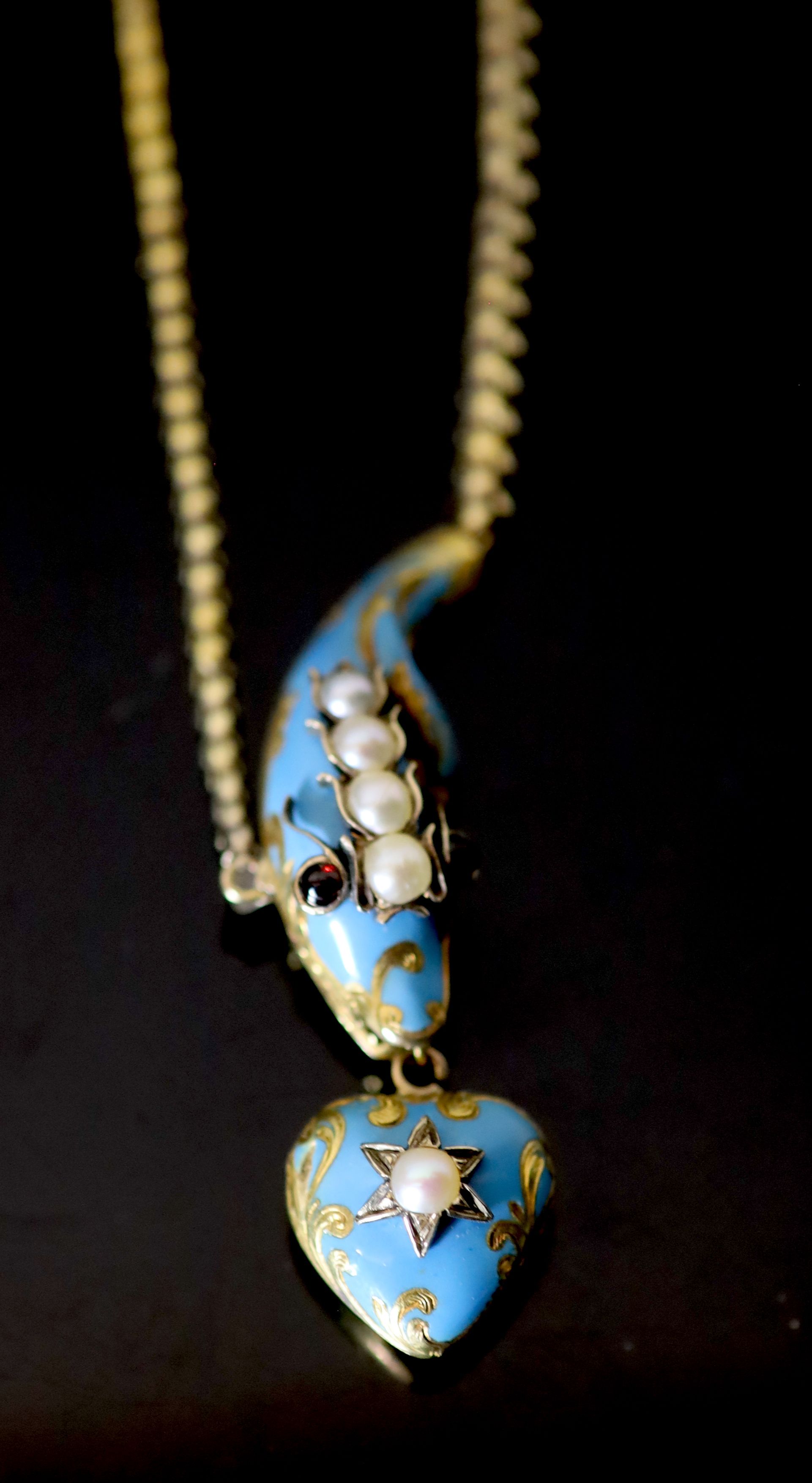 A Victorian gold, enamel, split pearl and cabochon garnet set serpent necklace, with heart shaped drop,